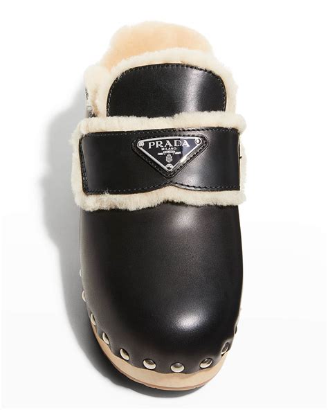 prada shearling clog|Prada naplak leather mules.